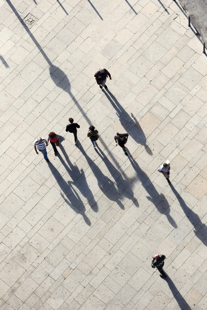 Top view on walking humans